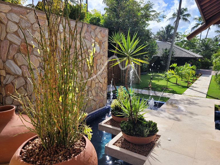 Casa com praia privada para suas férias de sonho