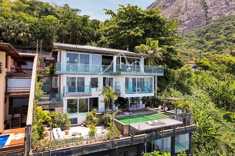 Casa de luxo com piscina infinita para aluguel de férias em